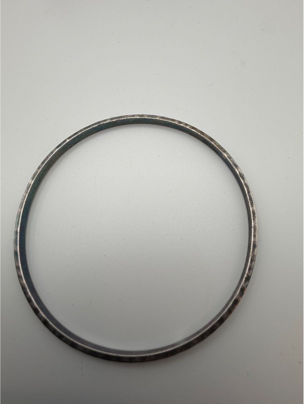 Silver tone slim bangle bracelet